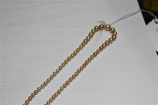 A single strand graduated natural pearl necklace, with old cut diamond cluster set yellow metal clasp.